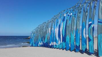 On the beach, beach umbrellas, beach towels