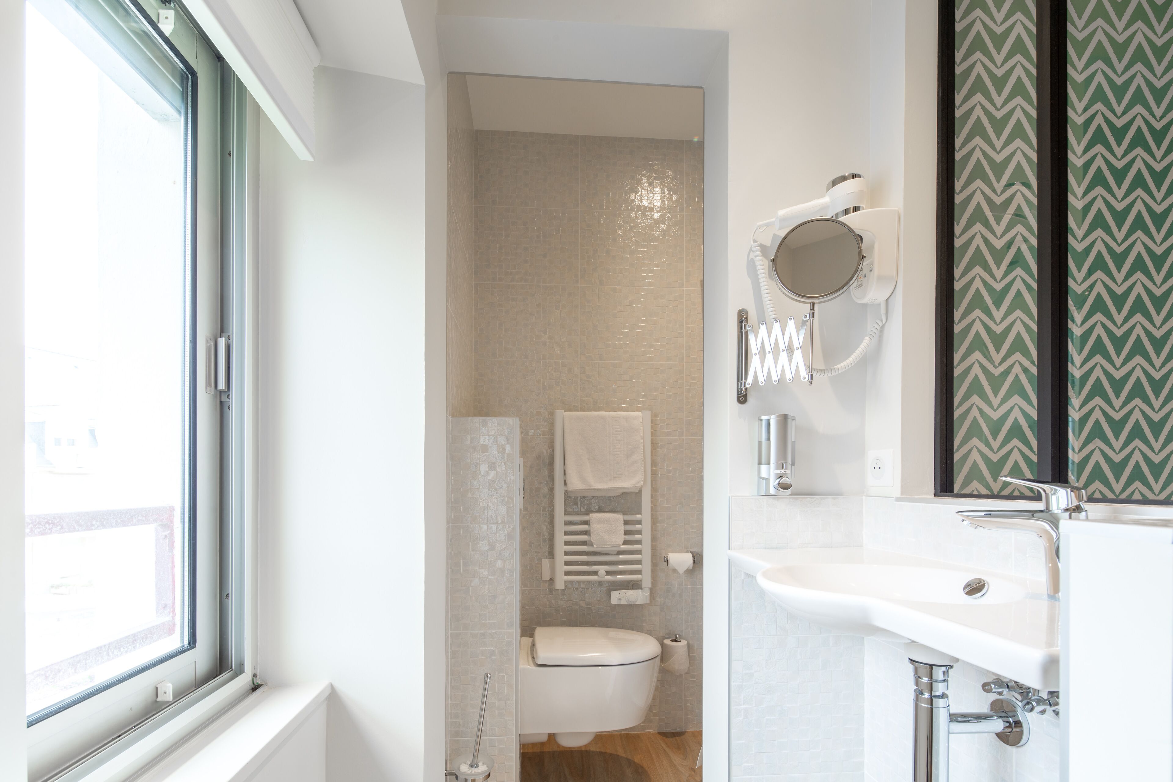 small simple room | bathroom | free toiletries, hair dryer, towels, soap