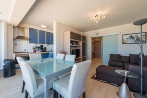 Apartment, 2 Bedrooms (San Remo 501) | Living area | Flat-screen TV