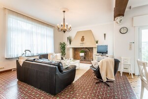 Apartment, 4 Bedrooms (Marsouins) | Living room | Flat-screen TV, DVD player