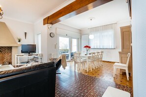 Apartment, 4 Bedrooms (Marsouins) | Living area | Flat-screen TV, DVD player