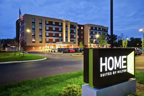 A modern hotel building with a sign reading "HOME 2 SUITES BY HILTON" in front. - Home2 Suites by Hilton Amherst Buffalo (Buffalo)