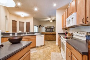 Fridge, stovetop, cookware/dishes/utensils, freezer