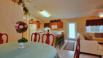 Full-size fridge, dishwasher, cookware/dishes/utensils