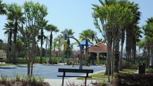 A park with a basketball court, a playground, and a gazebo. - Terra Verde 665 (Kissimmee)