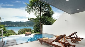 A modern pool area with a view of the sea and mountains. - Villa 8 oceanfront pool villa (Tambon Patong)