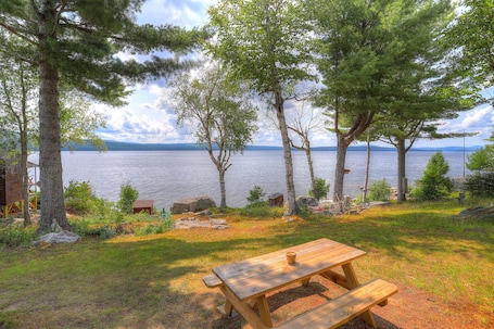 Outdoor dining. Four Loons | Waterfront | Pet Friendly