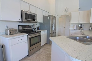 Fridge, microwave, oven, stovetop - Tranquil Retreat with Extended Lanai #313 (Rotonda West)