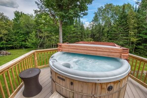 Outdoor spa tub - 7 Valley View Lodge - Private, exquisitely decorated chalet close to downtown Rangeley. (Rangeley)