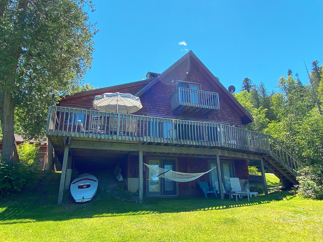 Stone - This Rangeley Lake home has a very level entry to the water with a huge deck!