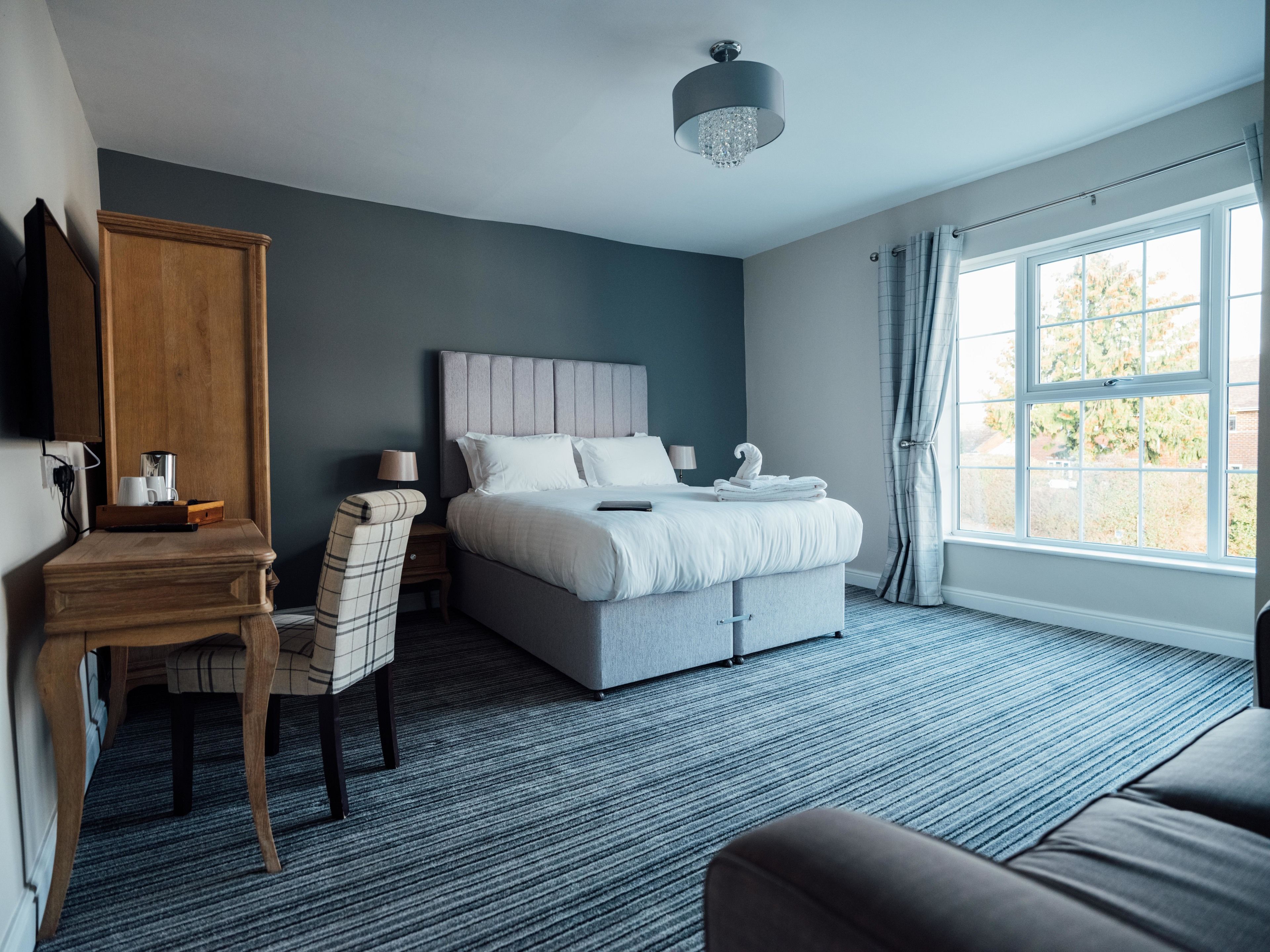 Deluxe-Doppel- oder -Zweibettzimmer, 1 King-Bett und Schlafsofa | Wohnbereich