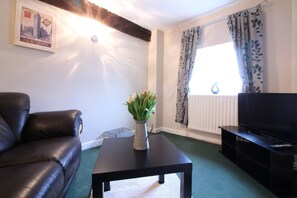 Phòng đơn | Khu phòng khách | TV màn hình phẳng 