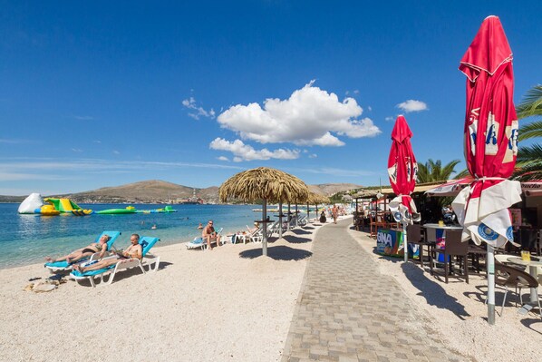 Beach nearby, sun loungers