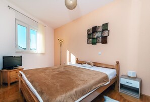 1 chambre, fer et planche Ă repasser, Wi-Fi, draps fournis