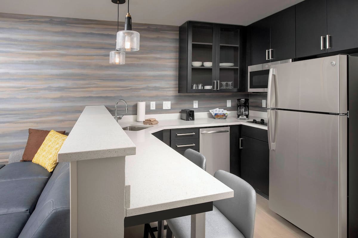 studio, 1 king bed with sofa bed | private kitchen | full-sized fridge, microwave, stovetop, dishwasher