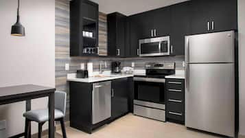 Suite, 1 Bedroom | Private kitchen | Full-size fridge, microwave, stovetop, dishwasher