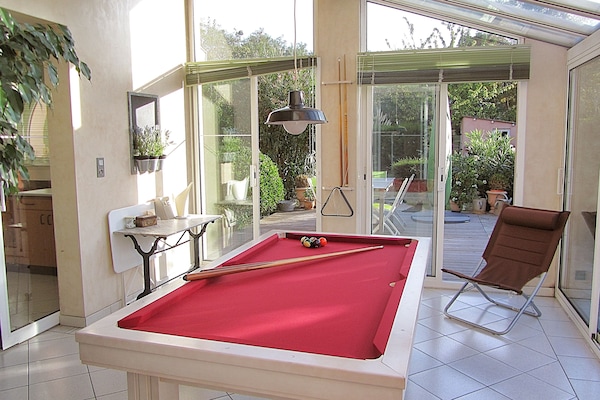 Une partie de billard dans la véranda