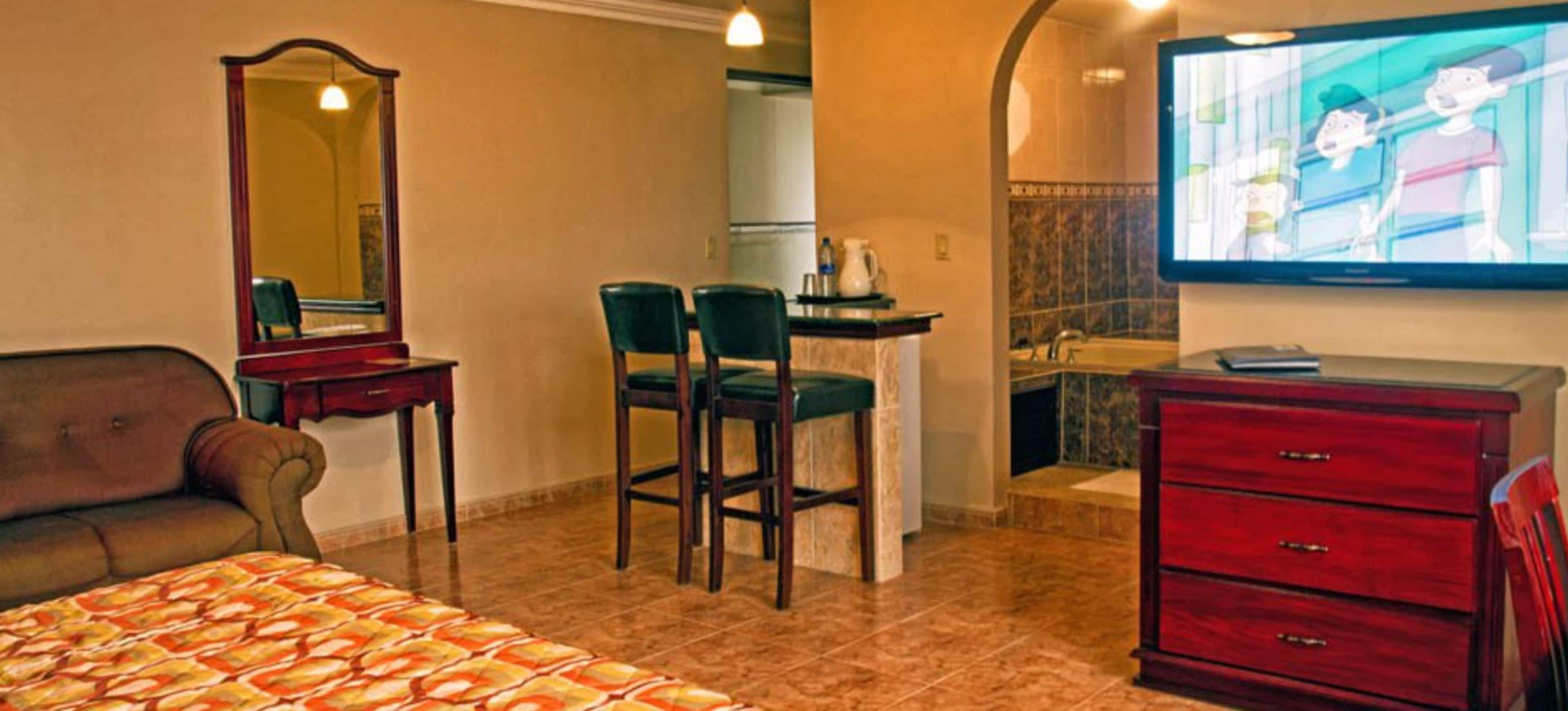 suite, 1 king bed, non smoking | in-room safe, desk, free wifi, bed sheets