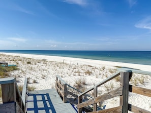 On the beach, sun-loungers
