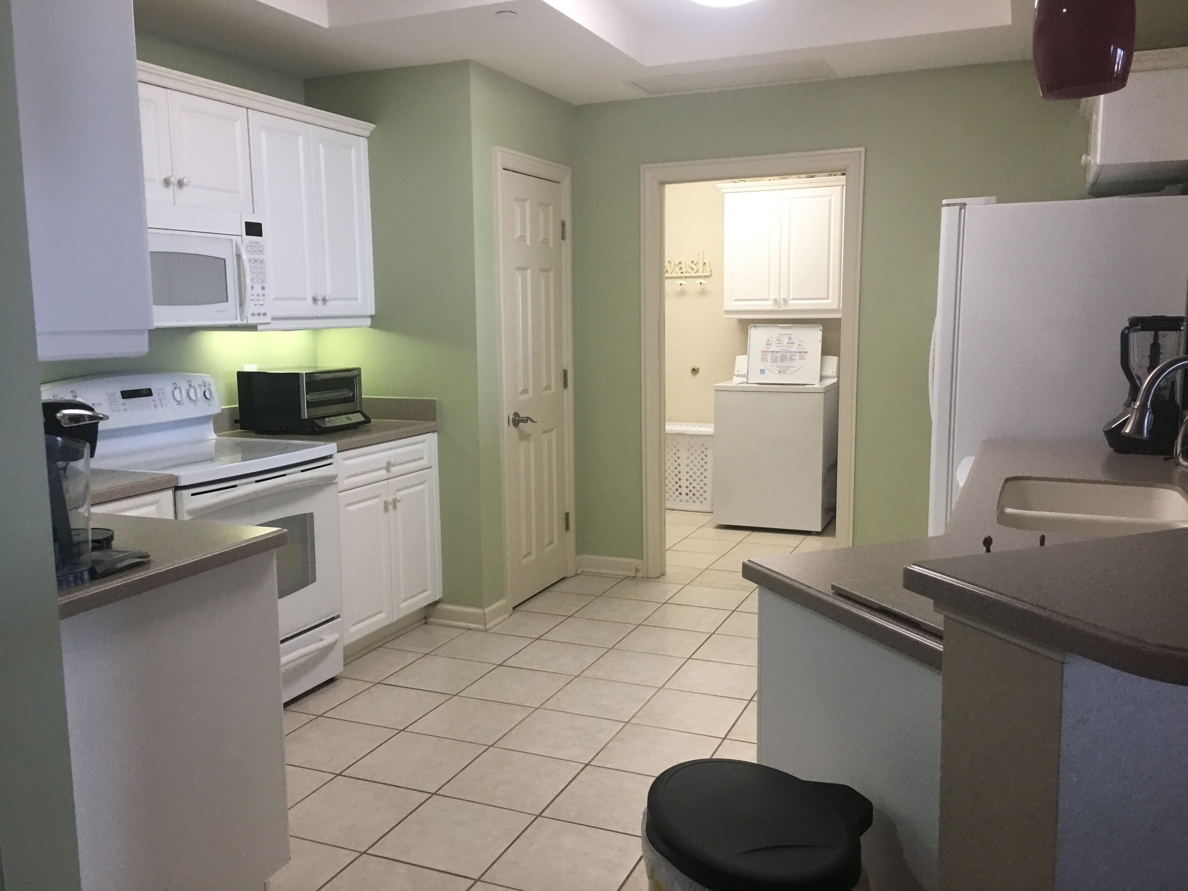 OCEANFRONT OASIS.  Waves echo throughout this cozy family condo. 