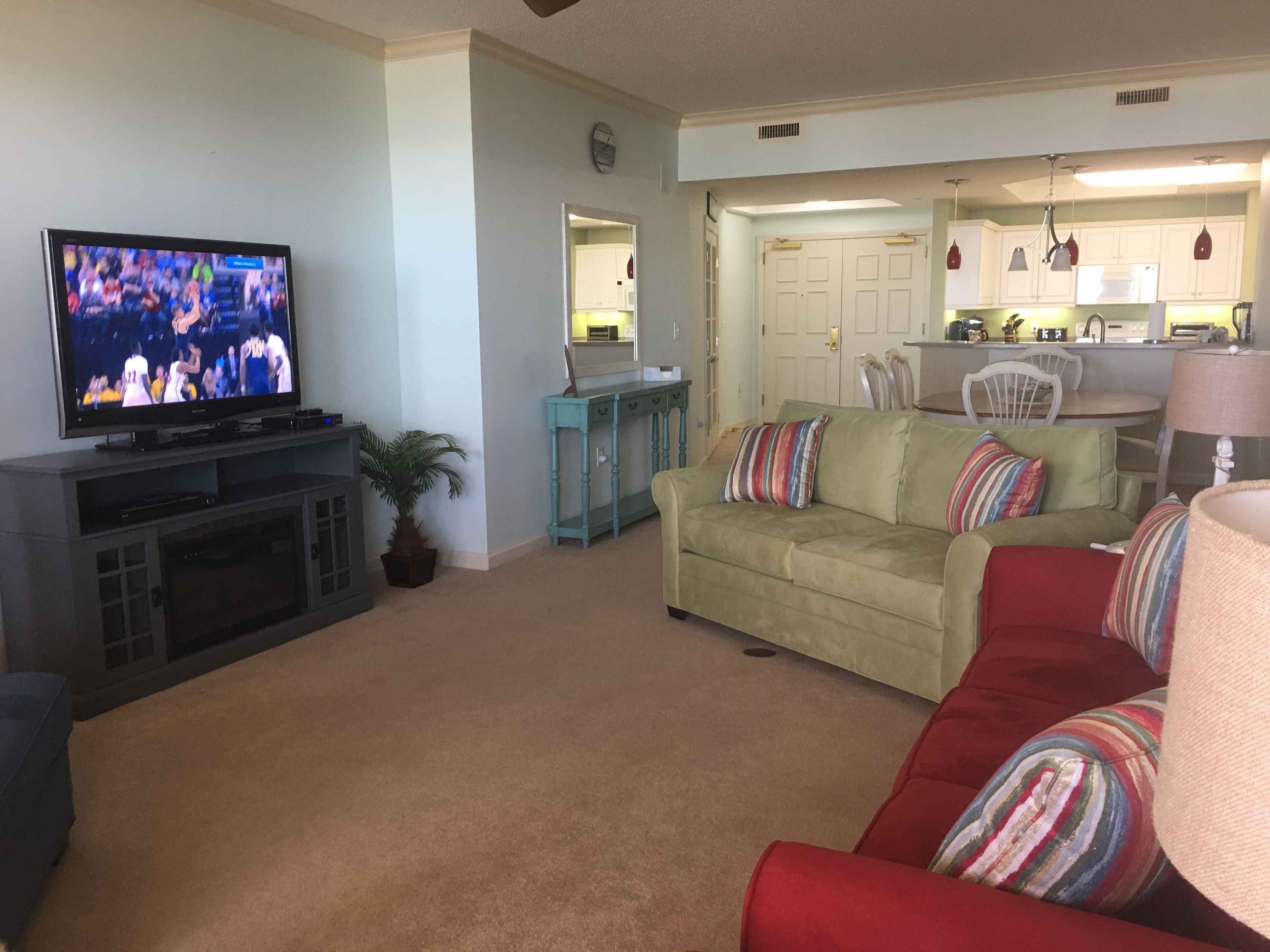OCEANFRONT OASIS.  Waves echo throughout this cozy family condo. 