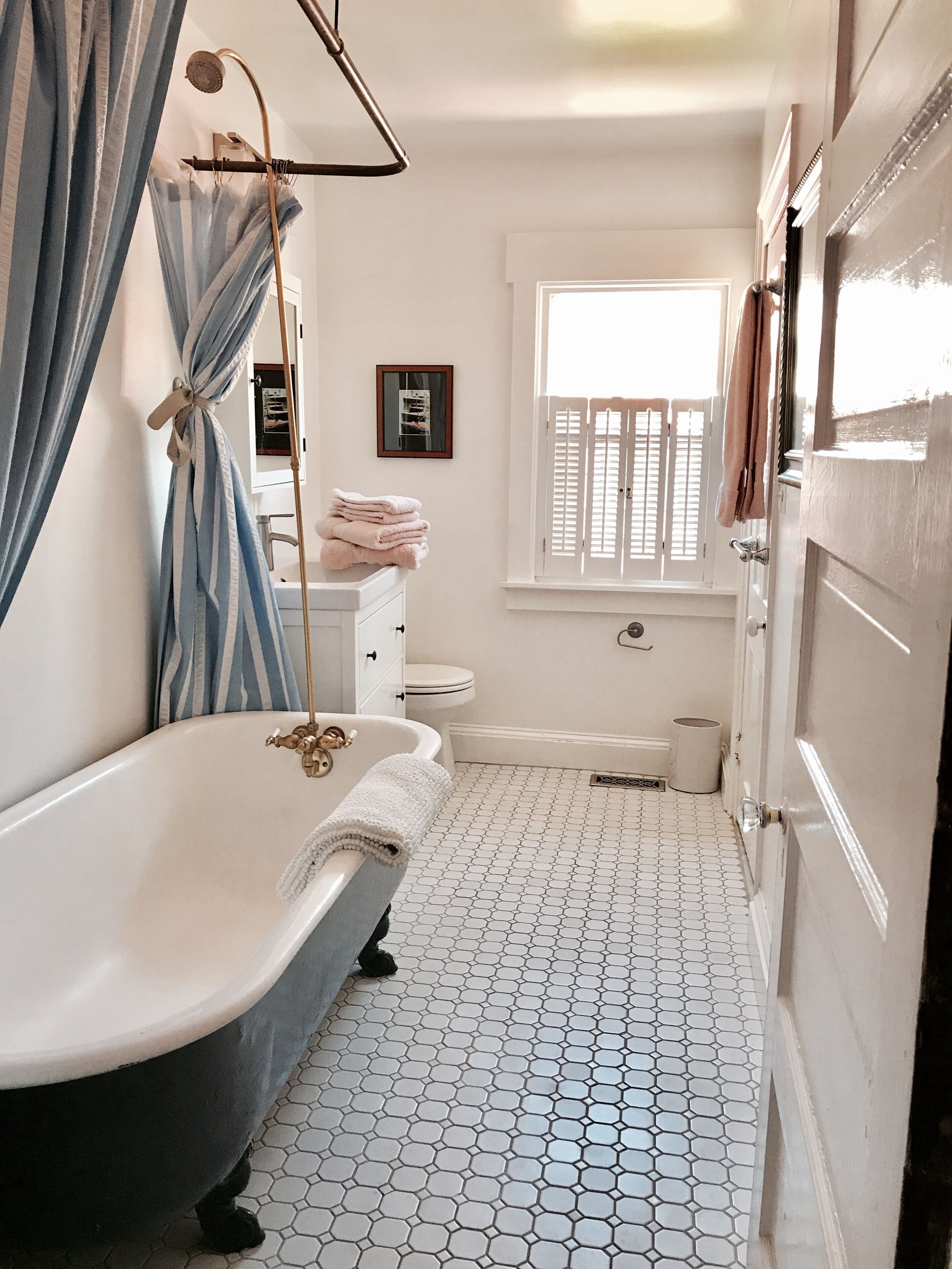 Combined shower/tub, hair dryer, towels, soap