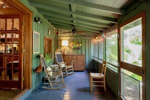 Front porch extends the length of the main living area