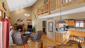 Télévision, cheminée, lecteur de DVD