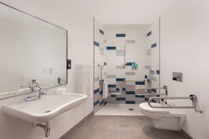 Shower, free toiletries, hair dryer, towels