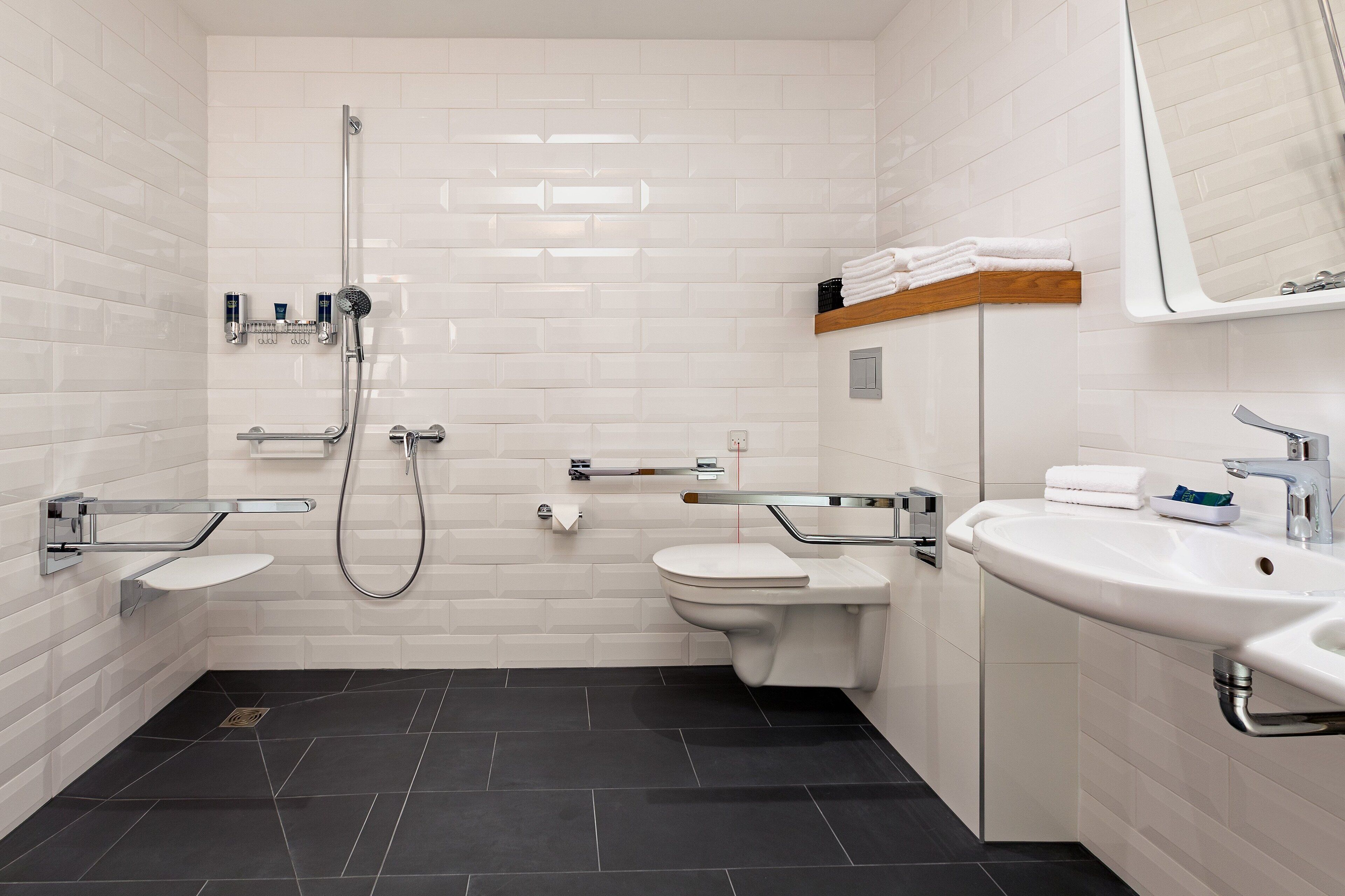 classic room, 1 king bed | bathroom | shower, free toiletries, hair dryer, towels