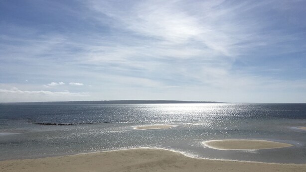 A beach with clear skies and calm waters. - * * * Aquamarine * * *
Right next to the beach (Baudin Beach)