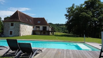 Outdoor pool, pool umbrellas, pool loungers
