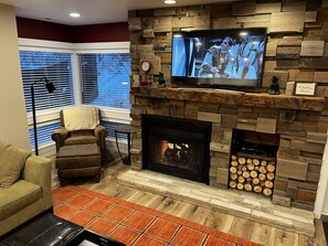 Smart TV, fireplace, DVD player, books