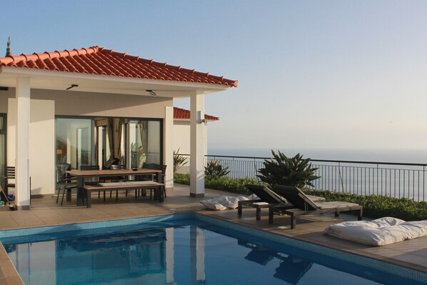 Outdoor pool, a heated pool - Quinta Falcoes, luxury villa, sleeps 8, stunning sea views, heated pool (Faja Da Ovelha)