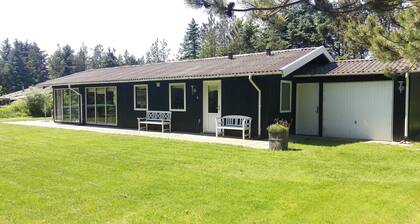 A wooden house on the beautiful West Coast with the width beautiful beaches.