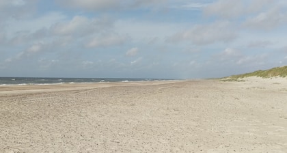 A wooden house on the beautiful West Coast with the width beautiful beaches.