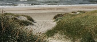 A wooden house on the beautiful West Coast with the width beautiful beaches.