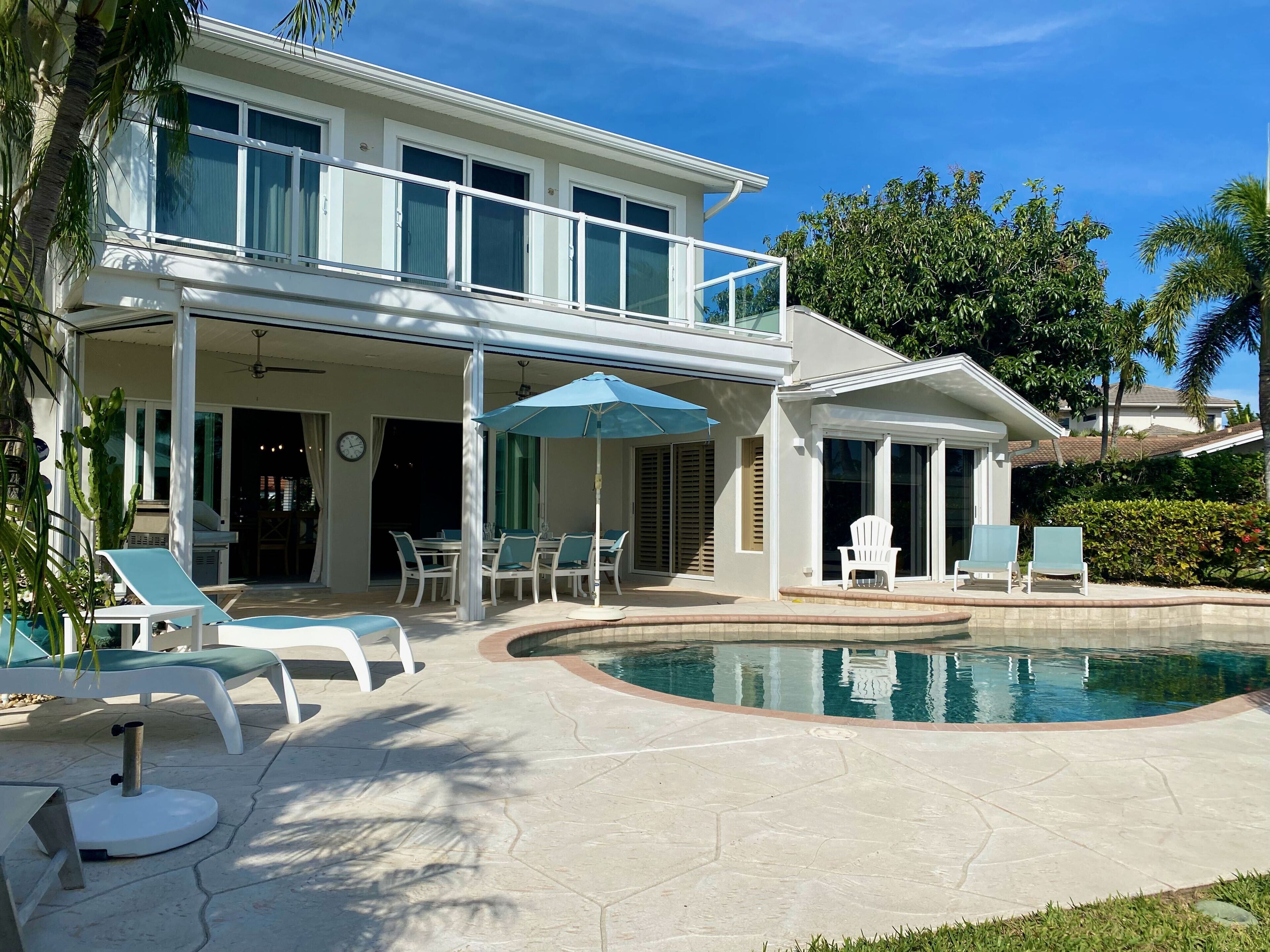 luxury villa with a tropical garden, large terrace, pool, near the beach