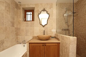 Shower, hair dryer, towels, toilet paper