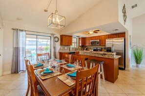 Dining - Villa Ellie Mona - Elec-heated pool home on Gulf-access canal w/bikes & kayaks - SWFL Rentals (Cape Coral)