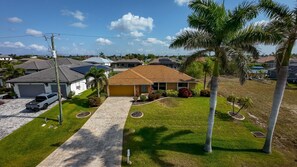 Exterior - Villa Ellie Mona - Elec-heated pool home on Gulf-access canal w/bikes & kayaks - SWFL Rentals (Cape Coral)