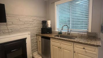 Microwave, coffee/tea maker, cookware/dishes/utensils