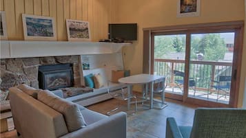 Superior Condo | Living area | Flat-screen TV