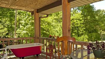 Relaxing Front Porch with claw footed soaking tub