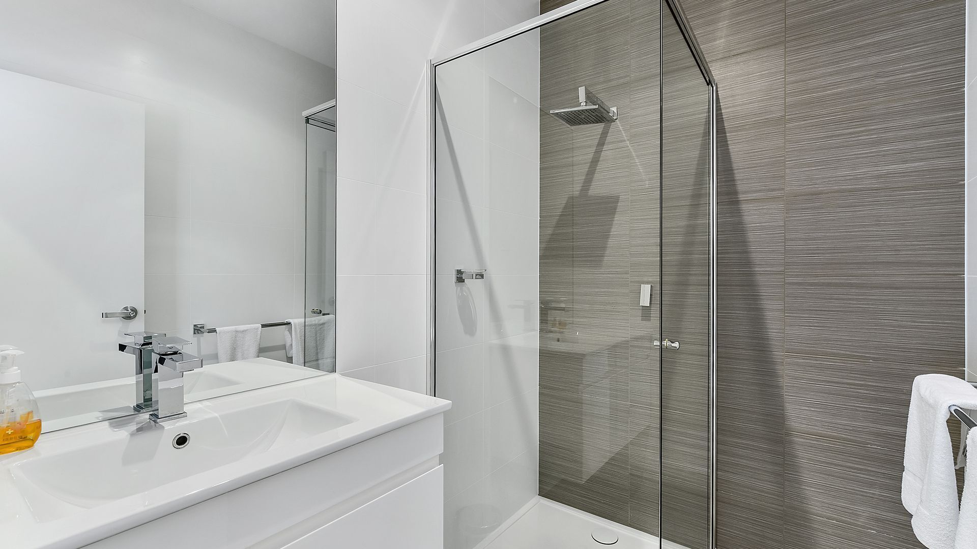 Bathtub, hair dryer, towels, soap