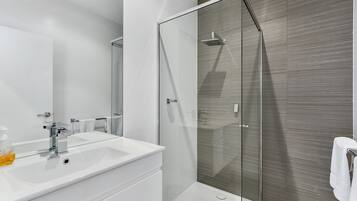 Bathtub, hair dryer, towels, soap