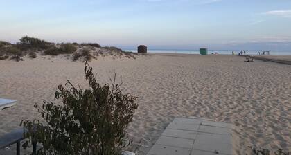 Modern villa with private pool and aircon, walk to beach and town.
