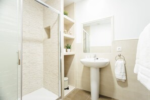 Shower, free toiletries, hair dryer, towels