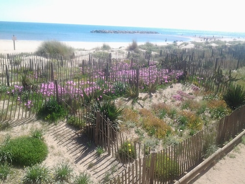 Ground floor apartment in villa, seafront, beachfront.