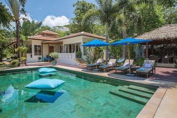 Baan Jasmine and its stunningly large Bali stone pool & sun loungers